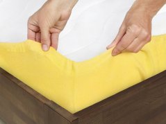 Froté prostěradlo s napínací gumou - světle žluté